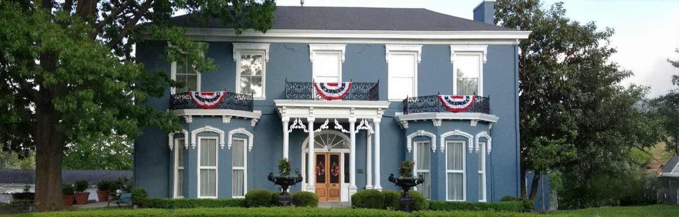 blue historical house in richmond, ky