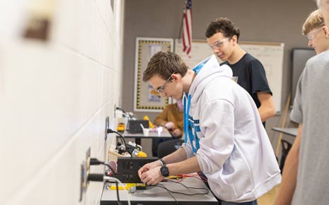 Two students working hands-on